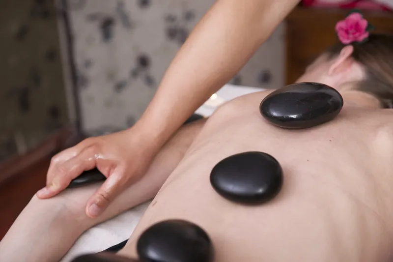 Stress relief massage with warm basalt stones